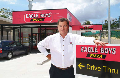 Tom Potter, the founder of Eagle Boys Pizza, showcasing his entrepreneurial spirit and leadership in the food industry, symbolizing success in franchising and innovation.