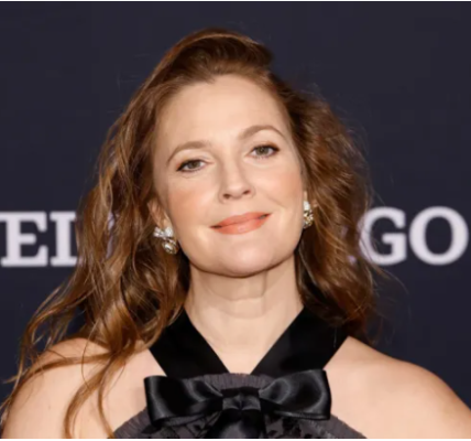 A close-up portrait of Drew Barrymore, a famous American actress