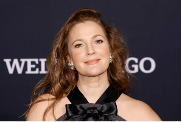 A close-up portrait of Drew Barrymore, a famous American actress