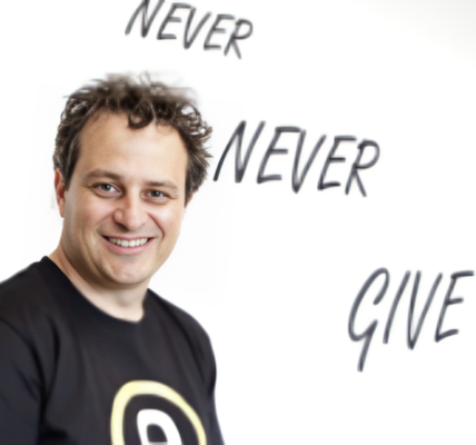 Matt Bullock, founder and CEO of eWAY, an Australian fintech company, standing confidently in a business setting, symbolizing his leadership in revolutionizing online payments.