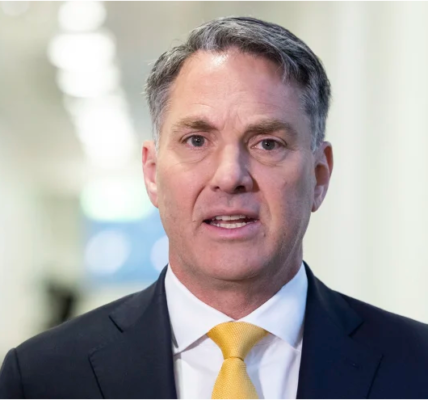 Richard Marles MP, in formal attire, addressing the media as Australia’s Deputy Prime Minister and Minister for Defence, focusing on national security initiatives.