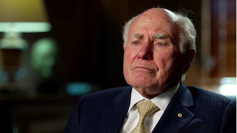 John Howard critiques Donald Trump, stating he is "not compatible with democracy" in a recent interview.