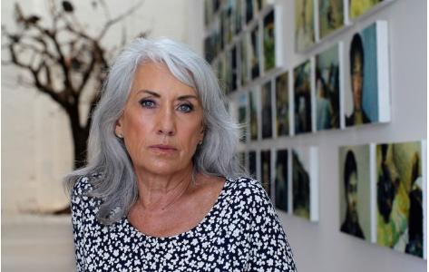 Judith Neilson, a visionary philanthropist and advocate for the arts, stands in front of a contemporary art installation at the White Rabbit Gallery.