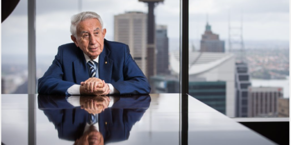 Portrait of Harry Oskar Triguboff, a prominent Australian billionaire real estate developer known for founding Meriton and transforming urban living.