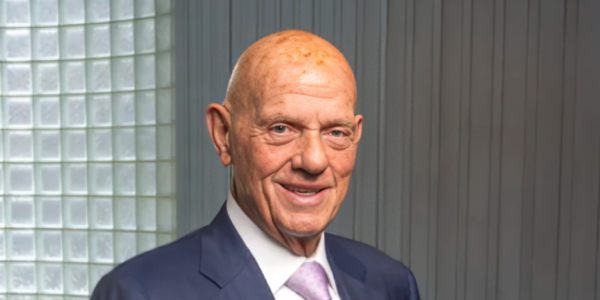 Solomon Lew, a prominent Australian businessman and influential figure in the retail industry, known for his leadership and strategic vision in major retail ventures across Australia.