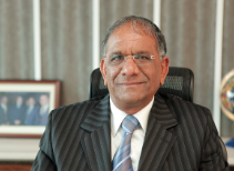 Govind Dholakia, Indian businessman and Rajya Sabha member, speaking at an event. Dholakia, founder of Shree Ramkrishna Exports, is known for his success in the diamond industry and philanthropic efforts.