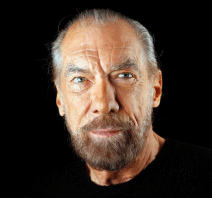 John Paul DeJoria smiling in a professional portrait, co-founder of Paul Mitchell and Patrón Spirits
