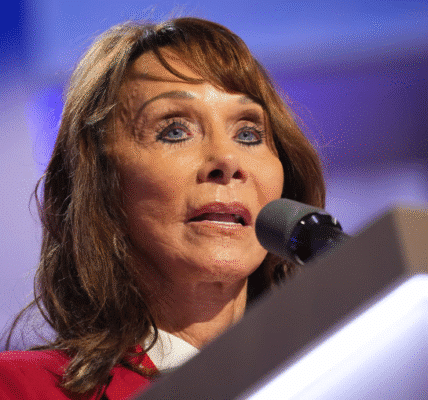 Diane Hendricks smiling in a professional portrait, wearing a black blazer